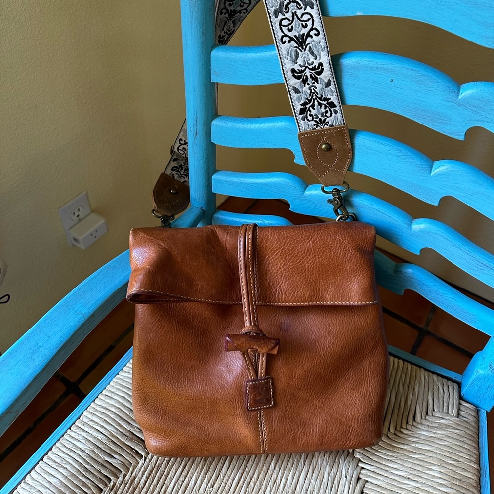 Dooney and Bourke leather crossbody bag with toggle